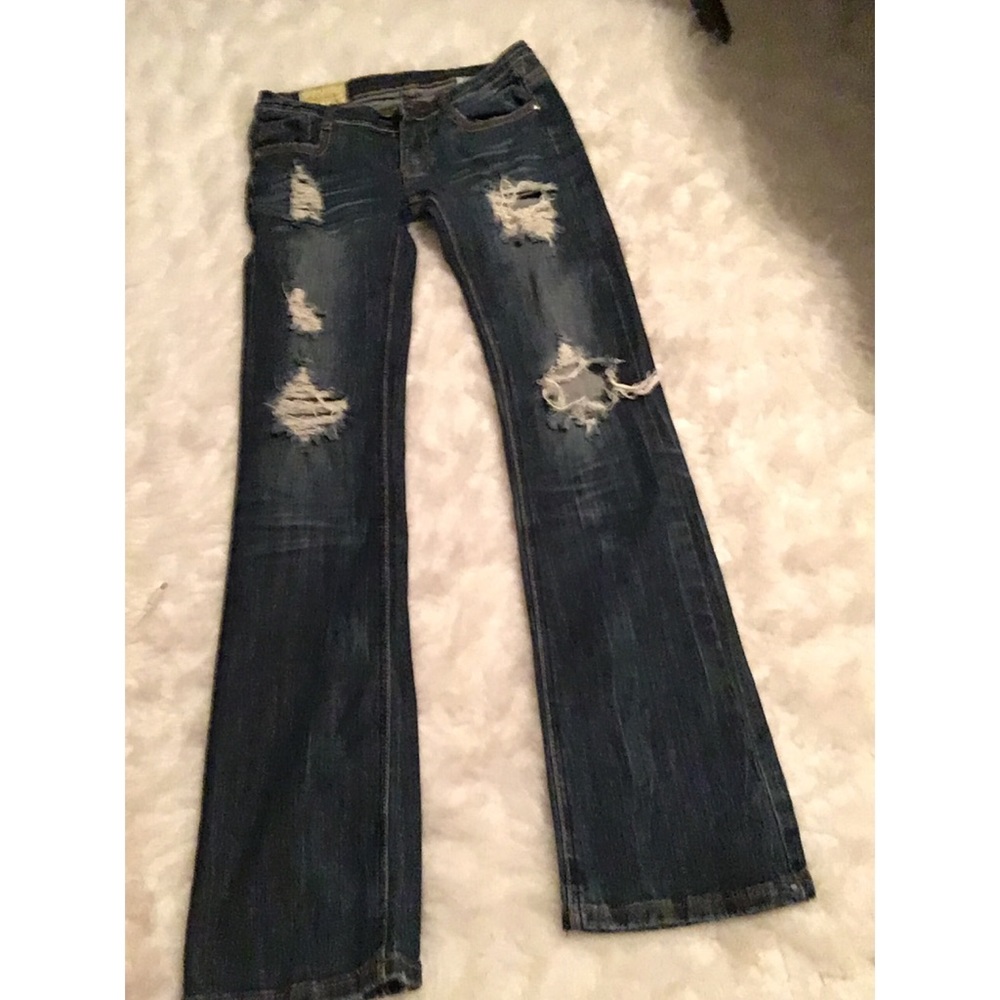 Preowned distressed dark denim